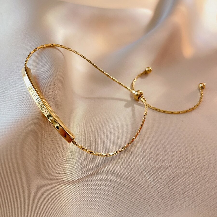 Gold Plated Stainless Steel Curved Tube Charm Bracelet – Adjustable Pull Cord Design for Daily Wear